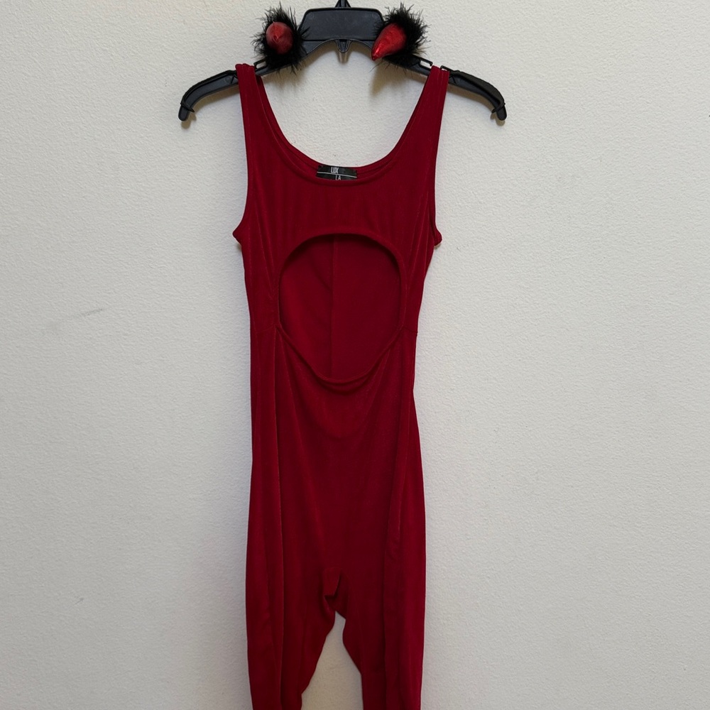 SIZE S ONE PIECE 
COULD BE HALLOWEEN COSTUME WITH THE HORNS ILL INCLUDE THEM